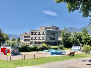 a building with two skate ramps in a park at Jugendherberge Innsbruck - Youth Hostel in Innsbruck