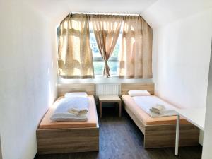Postel nebo postele na pokoji v ubytování Jugendherberge Innsbruck - Youth Hostel