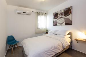 Postel nebo postele na pokoji v ubytování La Maison de Raphael