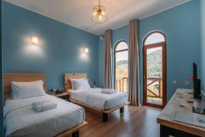 Postel nebo postele na pokoji v ubytování Hotel Chateau Iveri + 37 fotografií