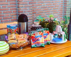 a table with snacks and other food on it at Hotel Kaiserhof in Munster im Heidekreis