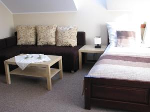 En eller flere senge i et værelse på Ostrowo Morza Brzeg