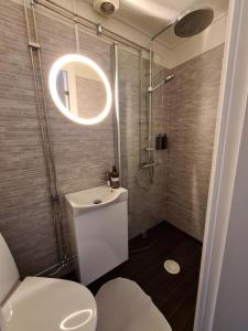 Koupelna v ubytování Dala-Järna Hotell och Vandrarhem