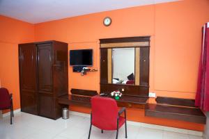 TV a/nebo společenská místnost v ubytování DAFFODILS SERVICED APARTMENT