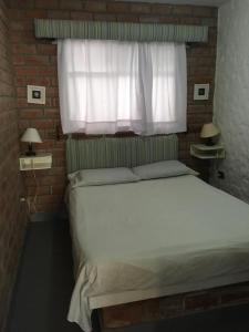 Katil atau katil-katil dalam bilik di Bungalows Cerro Azul