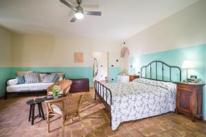 Posteľ alebo postele v izbe v ubytovaní Torrenova di Assisi Country House