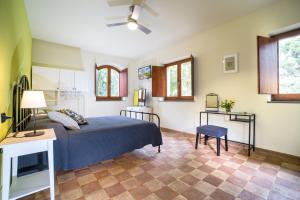 Posteľ alebo postele v izbe v ubytovaní Torrenova di Assisi Country House