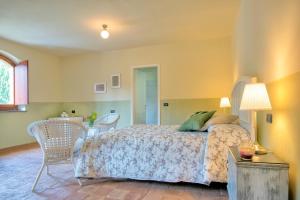 Posteľ alebo postele v izbe v ubytovaní Torrenova di Assisi Country House