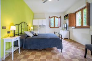 Posteľ alebo postele v izbe v ubytovaní Torrenova di Assisi Country House