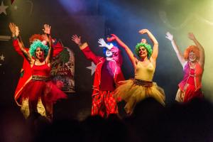 a group of people in clown costumes on a stage at Camping Club Le Littoral - Maeva in Argelès-sur-Mer