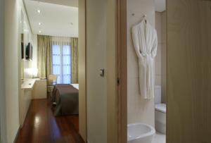 Een badkamer bij Hotel Mozart