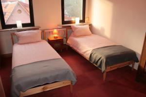 Cama o camas de una habitación en E Kurhaus Wohnung Nr 5