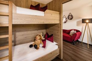 Posteľ alebo postele v izbe v ubytovaní Hotel Touring Dolomites