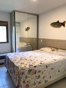 Giường trong phòng chung tại Ekoara Residence Porto de Galinhas