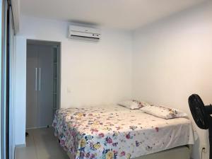 Giường trong phòng chung tại Ekoara Residence Porto de Galinhas +63 ảnh
