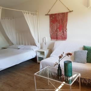 Ένα ή περισσότερα κρεβάτια σε δωμάτιο στο Casa Naya Rural