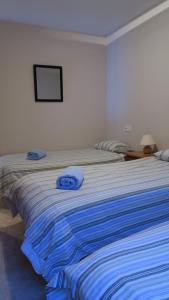 Ένα ή περισσότερα κρεβάτια σε δωμάτιο στο Casa Nova Regi