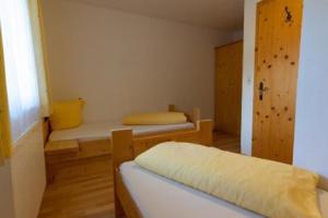 Postel nebo postele na pokoji v ubytování Ferienhaus Marian