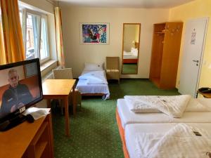 Postel nebo postele na pokoji v ubytování Berggasthof Hotel Igelwirt
