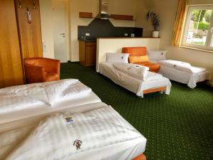 Postel nebo postele na pokoji v ubytování Berggasthof Hotel Igelwirt