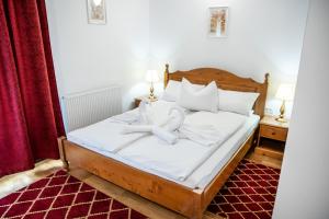 Postel nebo postele na pokoji v ubytování VILLA GHERMAN