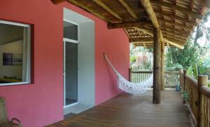 Uma varanda ou terraço em Pousada Tubes Maresias