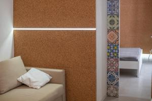 A bed or beds in a room at Casa Berenice