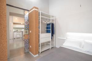 A bed or beds in a room at Casa Berenice