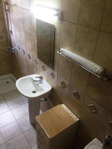 Ett badrum på Carpe Diem Guesthouse