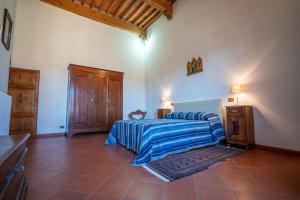 A bed or beds in a room at Il Casone