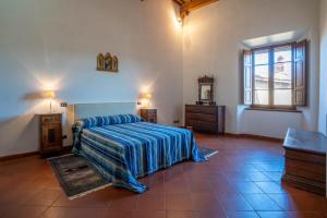 A bed or beds in a room at Il Casone