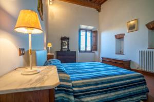 A bed or beds in a room at Il Casone