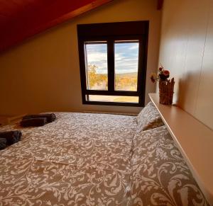 A bed or beds in a room at Las Casetas de Mateu