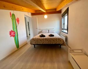 A bed or beds in a room at Las Casetas de Mateu