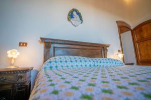 A bed or beds in a room at Il Casone