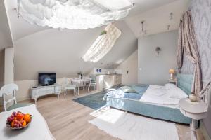 Posteľ alebo postele v izbe v ubytovaní Apartamenty Kurort