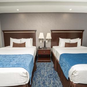 Postel nebo postele na pokoji v ubytování Comfort Suites Seabrook - Kemah