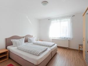 Ένα ή περισσότερα κρεβάτια σε δωμάτιο στο Spa Apartment, Bad Dürrheim