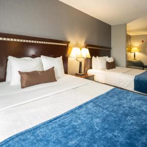 Postel nebo postele na pokoji v ubytování Comfort Suites Seabrook - Kemah