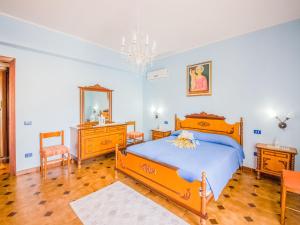 Voodi või voodid majutusasutuse Belvilla by OYO Appartamento spinesante toas