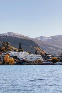 
a large body of water with mountains at Crowne Plaza Queenstown, an IHG Hotel in Queenstown
