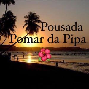 un panneau indiquant ponadi pomerania ponadi pomeranca dans l'établissement Pousada Pomar da Pipa, à Pipa