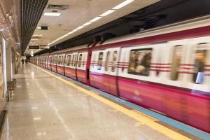 a train is speeding through a subway station at Crowne Plaza Istanbul Oryapark by IHG in Istanbul