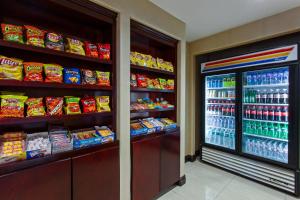 a store aisle with a display of food and drinks at Holiday Inn Express Hollywood Walk of Fame by IHG in Los Angeles