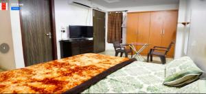 TV a/nebo společenská místnost v ubytování SSS Group Hotel, Dwarka, New Delhi