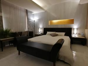 Postel nebo postele na pokoji v ubytování Michelle hotel