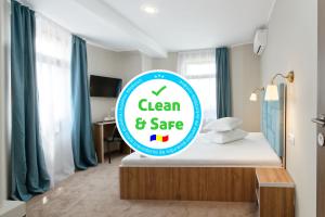 Postel nebo postele na pokoji v ubytování Hotel Bordeaux