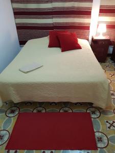 Uma cama ou camas num quarto em Casa de Virgilio - MOIRA