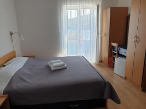 Postel nebo postele na pokoji v ubytování Sobe MaMaLu