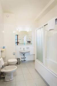 Vonios kambarys apgyvendinimo įstaigoje Residenza Cavour